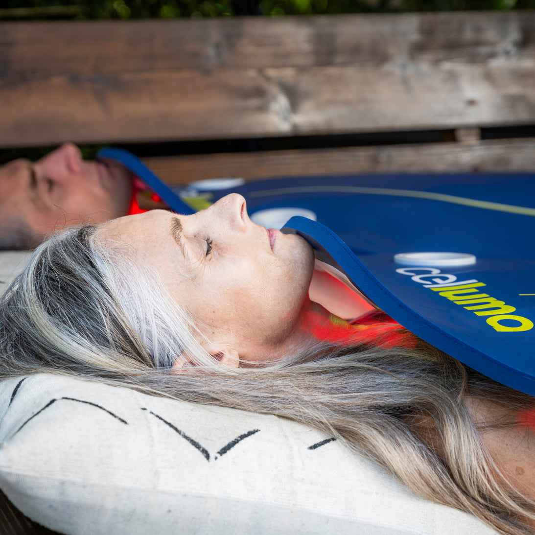 Couple using Celluma DELUX II full-body LED Red light therapy for rejuvenation, pain relief, and recovery.