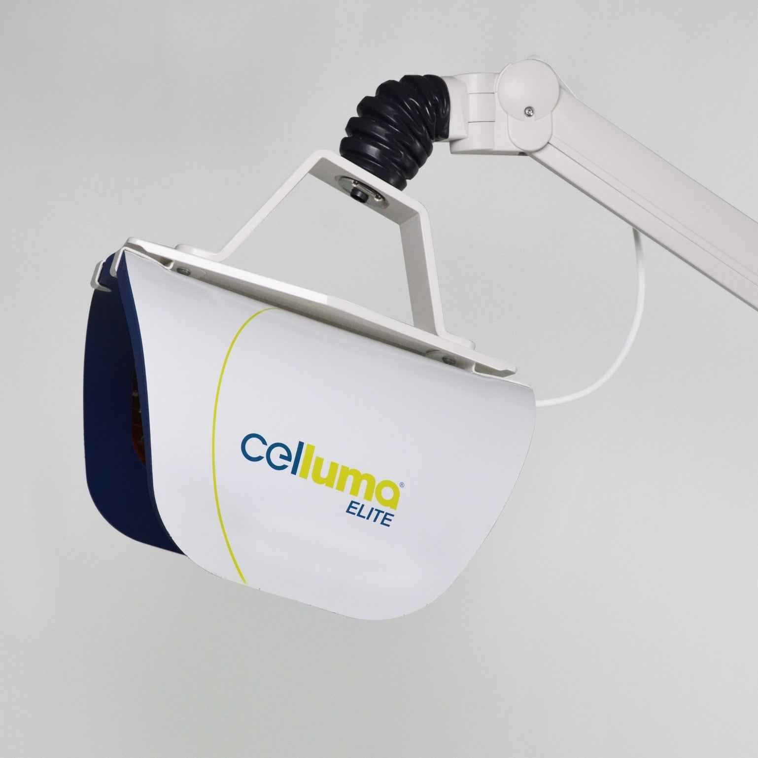 Celluma ELITE Professional LED Red Light Therapy Panel on a rotating arm.