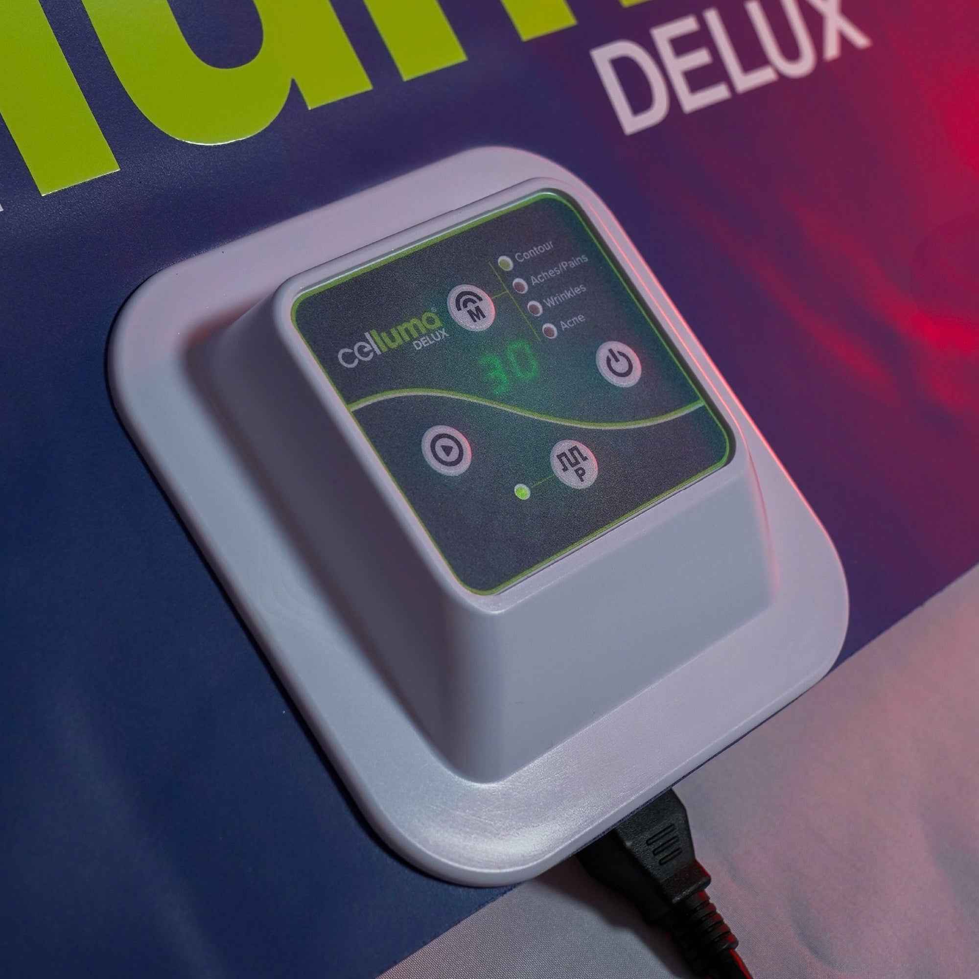 Celluma DELUX II LED red light therapy controller featuring 4 wellness and recovery modes.