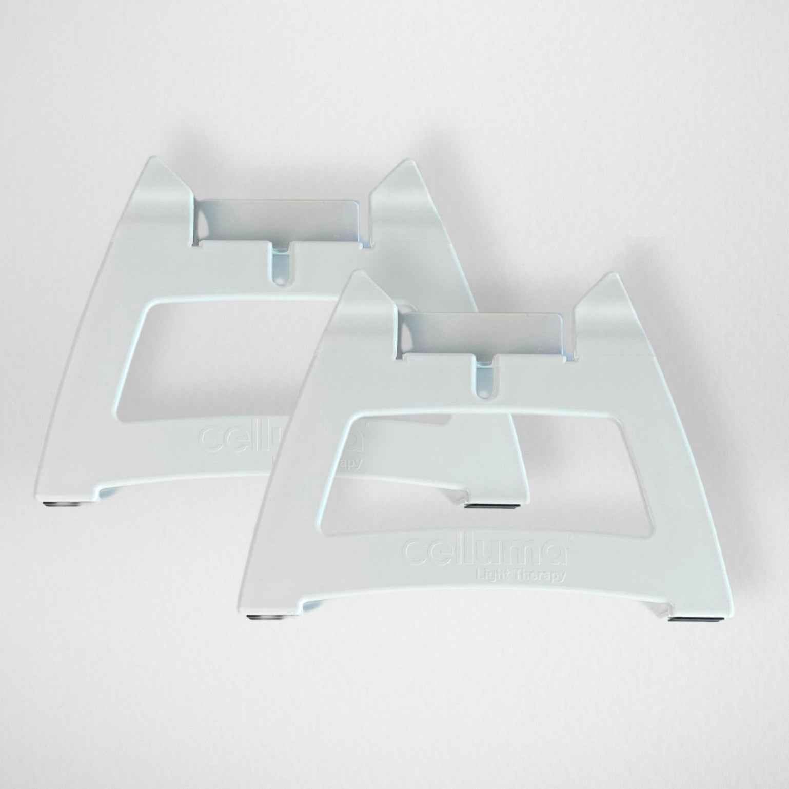 FDA-cleared Celluma NOVA LED red light therapy facial rest contouring the face and décolleté.