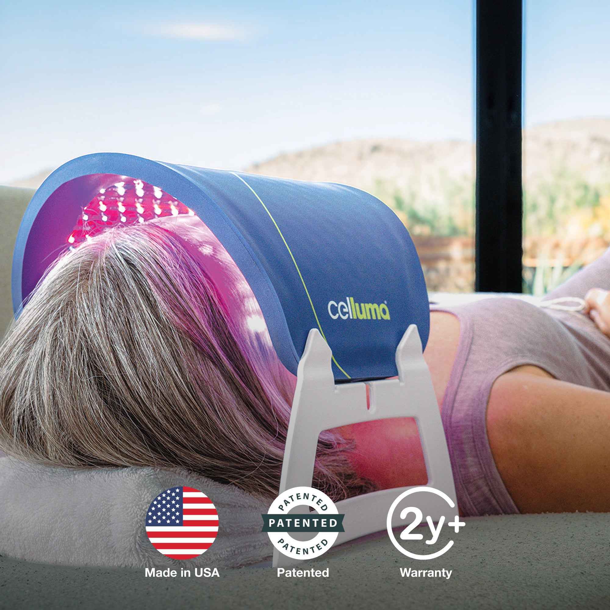 Woman using Celluma HOME LED red light therapy device to support collagen, elastin, and hyaluronic acid production.